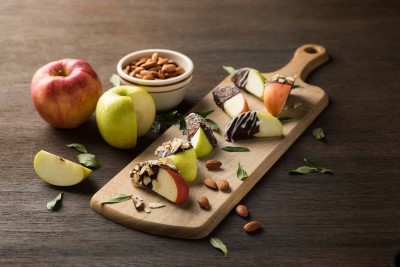 cheese board with almonds and snacks