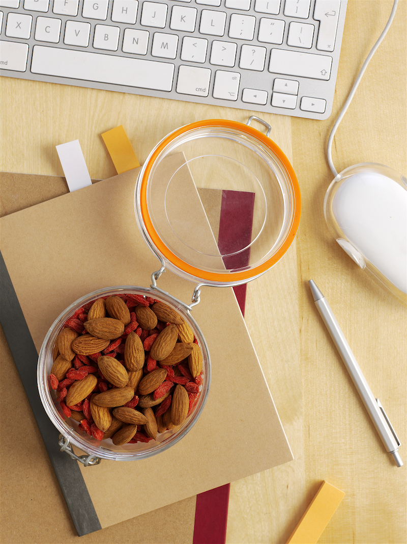 wooden spoons with almonds with wording describing their benefits